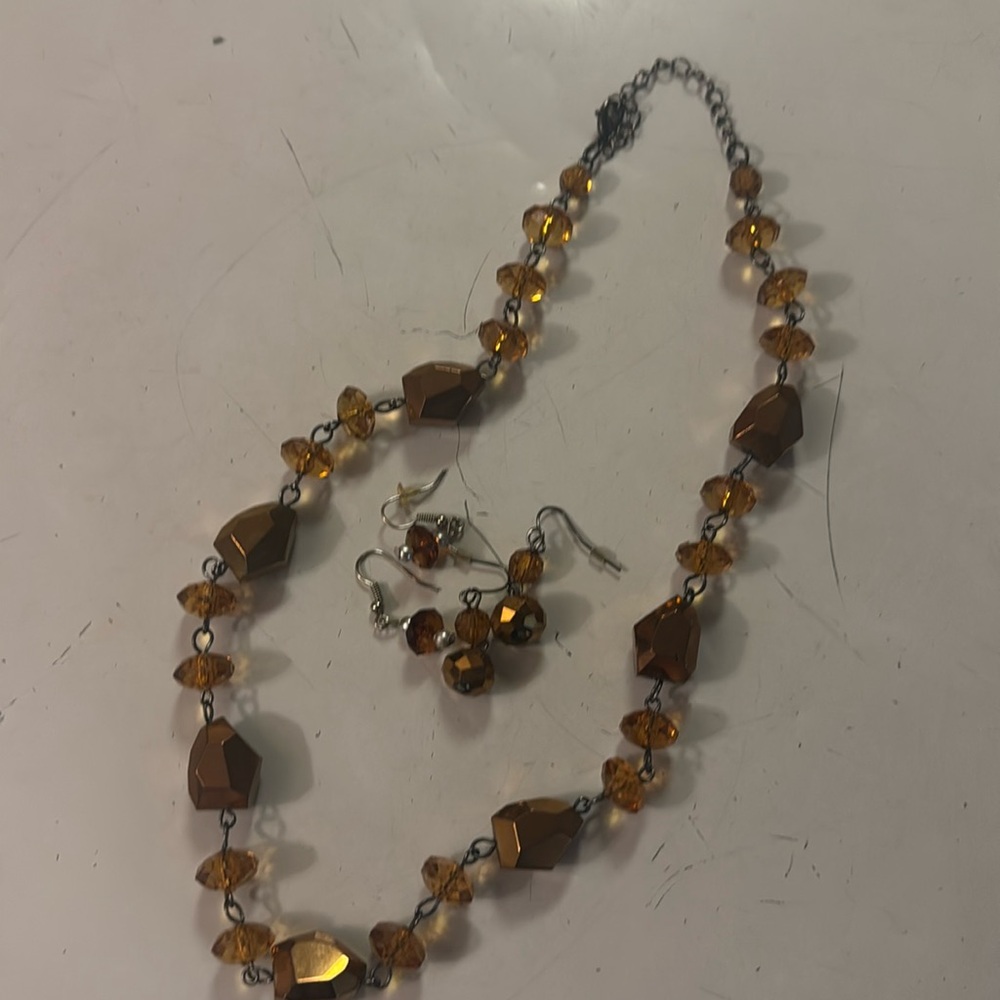 Gold/ brown necklace with 2 pair of earrings